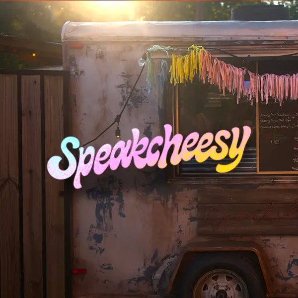 A food truck with a sign that says SpeakCheesy, popular on social media.