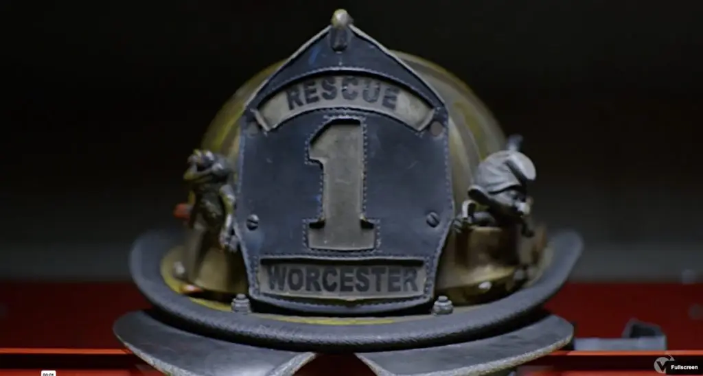 A firefighter's NFPA-compliant helmet with the number 1 on it.
