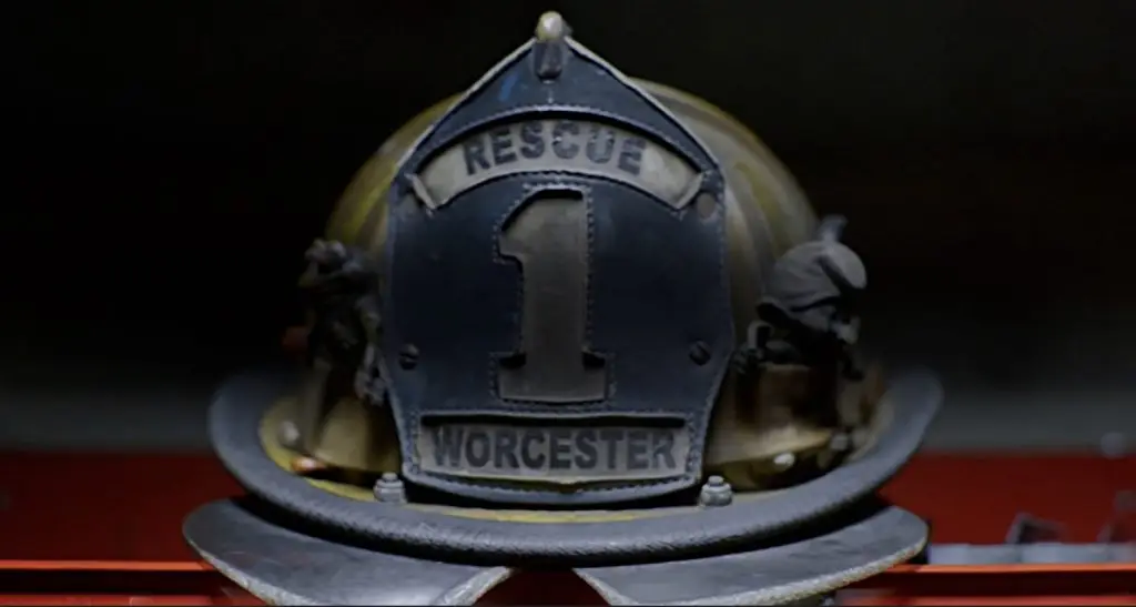 A firefighter's helmet, compliant with NFPA standards, with the number 1 on it.