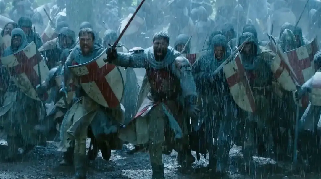 A group of knights in A&E armor walking through the rain.